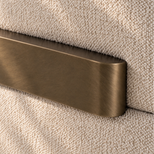 Load image into Gallery viewer, Quentin ivory gray upholstered accent chair with rounded arms, textured fabric and antique brass-finished metal accents.
