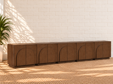 Load image into Gallery viewer, Regina 5-Piece Buffet Credenza in Brown Walnut with arched door detailing, interior shelving, and Art Deco design
