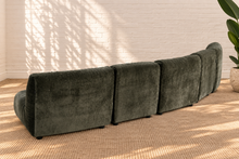 Load image into Gallery viewer, Reid five piece curved modular sectional sofa in forest sage green textured upholstery with plush channel detailing and low-profile armless seats.
