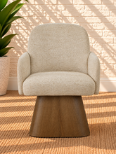 Load image into Gallery viewer, Rivas ivory upholstered swivel dining armchair with curved back and Brown Walnut solid wood base
