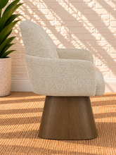 Load image into Gallery viewer, Rivas ivory upholstered swivel dining armchair with curved back and Brown Walnut solid wood base
