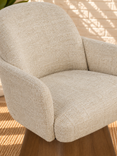 Load image into Gallery viewer, Rivas ivory upholstered swivel dining armchair with curved back and Brown Walnut solid wood base

