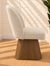 Load image into Gallery viewer, Rivas ivory upholstered swivel dining chair with curved back and natural walnut-finish base
