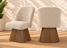Load image into Gallery viewer, Rivas ivory upholstered swivel dining chair with curved back and natural walnut-finish base
