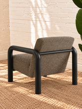 Load image into Gallery viewer, Riviera Onyx lounge chair with textured bouclé upholstery, rounded black wood arms, and padded seat and back
