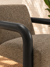 Load image into Gallery viewer, Riviera Onyx lounge chair with textured bouclé upholstery, rounded black wood arms, and padded seat and back

