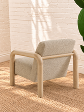 Load image into Gallery viewer, Riviera warm ivory bouclé lounge chair with rounded natural wood arms and upholstered seat and back
