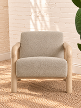 Load image into Gallery viewer, Riviera warm ivory bouclé lounge chair with rounded natural wood arms and upholstered seat and back
