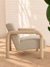 Load image into Gallery viewer, Riviera warm ivory bouclé lounge chair with rounded natural wood arms and upholstered seat and back
