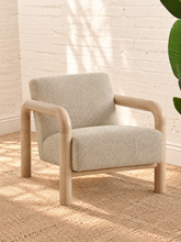 Load image into Gallery viewer, Riviera warm ivory bouclé lounge chair with rounded natural wood arms and upholstered seat and back
