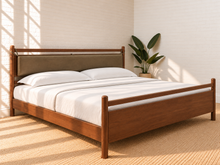 Load image into Gallery viewer, Rocco King platform bed with Walnut rubberwood frame, Taupe faux leather upholstered headboard pillow, and decorative leather straps.
