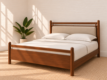Load image into Gallery viewer, Rocco Queen platform bed with Walnut rubberwood frame, Greige heathered fabric headboard pillow, and faux leather straps.
