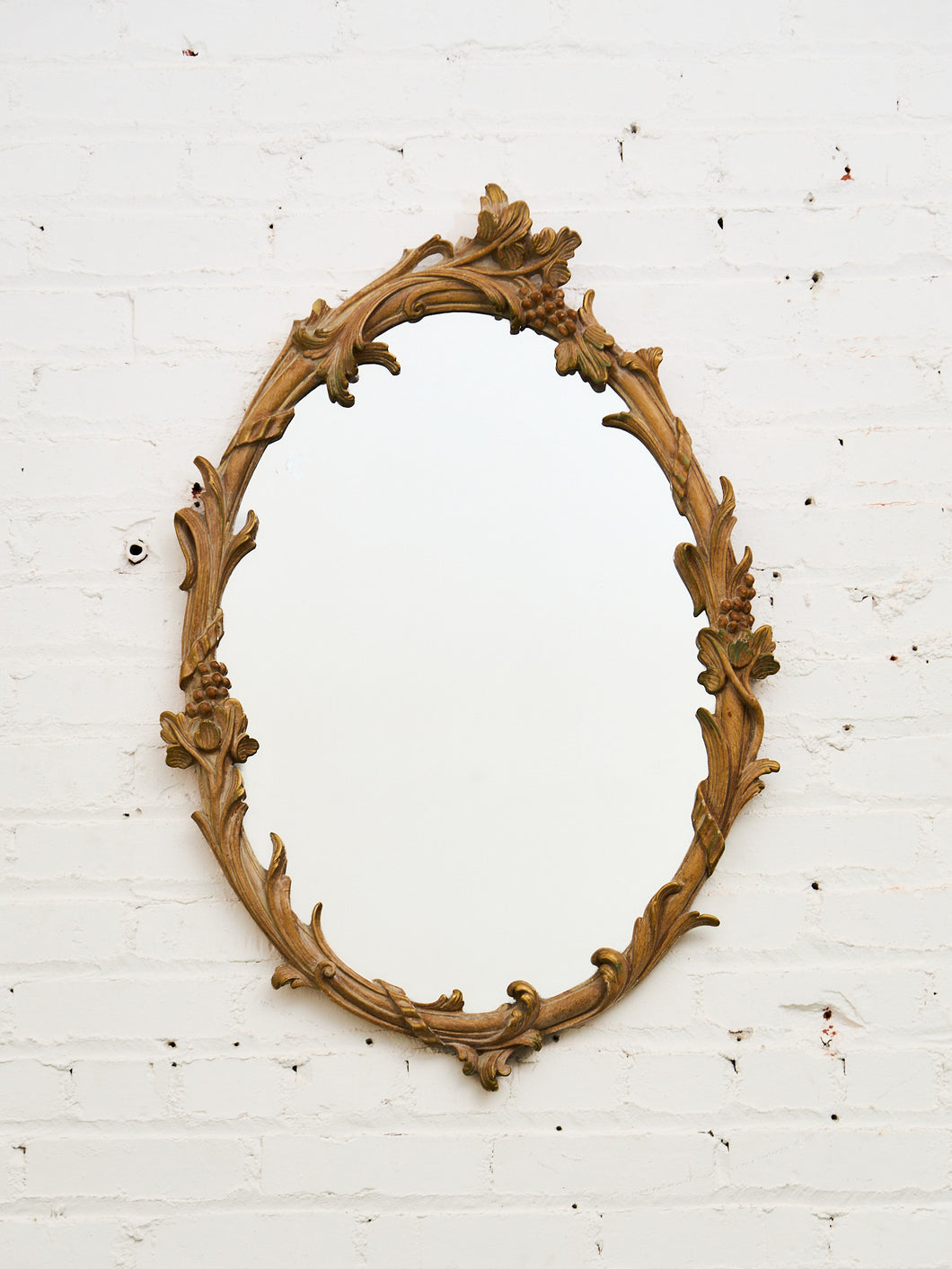 Vintage Ornate Oval Mirror in Distressed Ivory Resin
