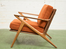 Load image into Gallery viewer, Ziggy Walnut Lounge Chair in Orange Corduroy
