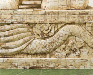 Pair of Monumental Carved Ox Bone Guardian Lions on Plinths