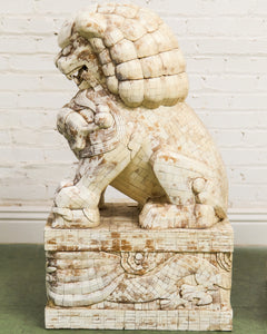 Pair of Monumental Carved Ox Bone Guardian Lions on Plinths