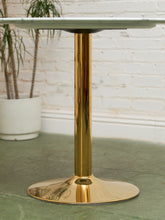 Load image into Gallery viewer, Jasmine Round Brass Base Tulip Table
