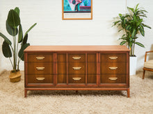 Load image into Gallery viewer, Mid-Century Walnut Long Dresser with Sculpted Details and Brass Pulls
