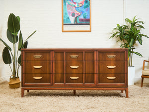 Mid-Century Walnut Long Dresser with Sculpted Details and Brass Pulls