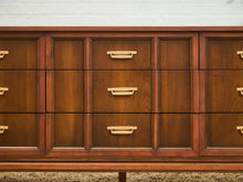 Load image into Gallery viewer, Mid-Century Walnut Long Dresser with Sculpted Details and Brass Pulls
