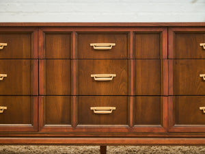 Mid-Century Walnut Long Dresser with Sculpted Details and Brass Pulls