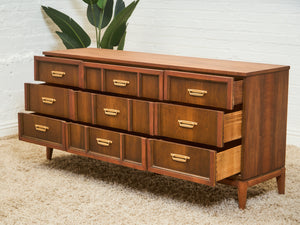 Mid-Century Walnut Long Dresser with Sculpted Details and Brass Pulls
