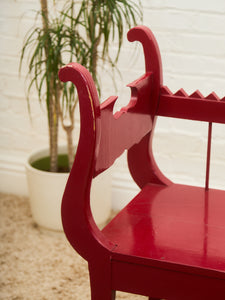 Red Lacquered Distressed Neoclassical Settee with Sculptural Silhouette