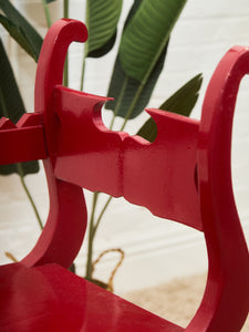 Red Lacquered Distressed Neoclassical Settee with Sculptural Silhouette