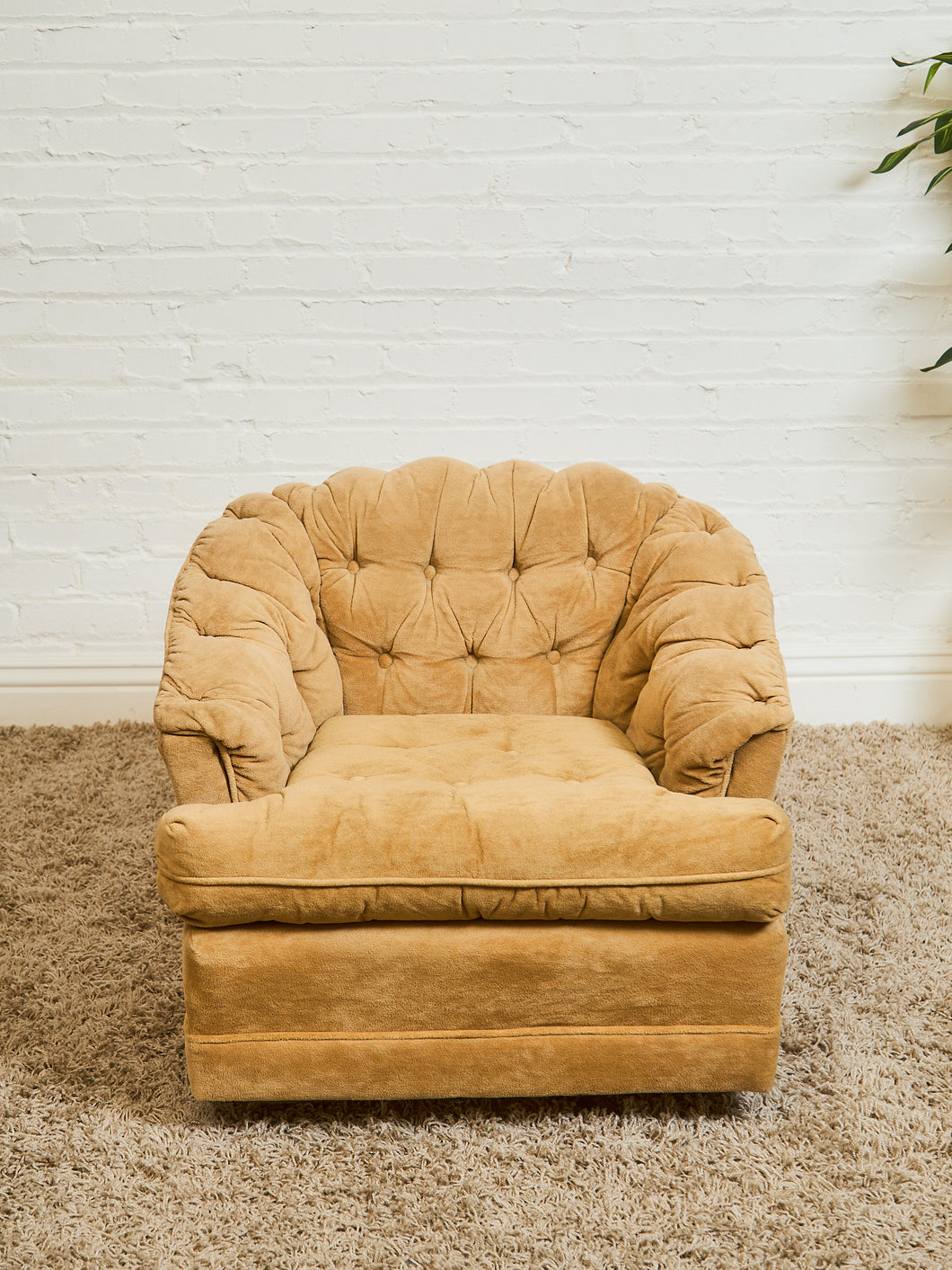 1970’s Brown Tufted Swivel Chair