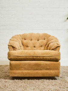 1970’s Brown Tufted Swivel Chair
