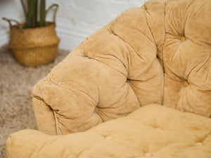1970’s Brown Tufted Swivel Chair