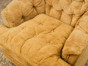 1970’s Brown Tufted Swivel Chair