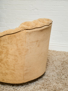 1970’s Brown Tufted Swivel Chair