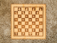 Load image into Gallery viewer, Vintage Handcrafted Wooden Chessboard with Medieval-Themed Designs
