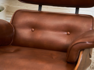 Iconic Chair and Ottoman in Cantina Saddle