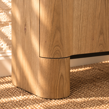 Load image into Gallery viewer, Sadie natural oak four-door credenza with rounded edges, integrated legs, white oak veneer, and interior shelving.
