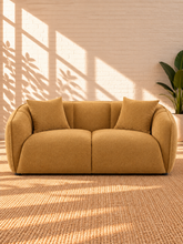 Load image into Gallery viewer, Image 1 of 5: Savino upholstered loveseat in Warm Ochre fabric with rounded shelter arms, channel back detailing, and plush two-seat cushions
