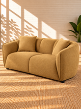 Load image into Gallery viewer, Image 3 of 5: Savino upholstered loveseat in Warm Ochre fabric with rounded shelter arms, channel back detailing, and plush two-seat cushions
