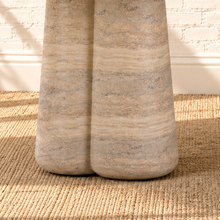 Load image into Gallery viewer, Selah round dining table with warm faux travertine finish, softly patterned top, and sculptural rounded pedestal base.
