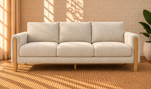 Load image into Gallery viewer, Image 1 of 4: Serano 75-inch three-seater sofa in Oatstone brushed Boucle fabric with tapered wood legs and cushioned seating
