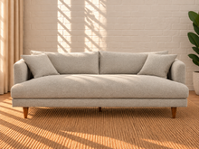 Load image into Gallery viewer, Image 1 of 5: Shelby upholstered sofa in Stone Mist boucle fabric with deep lounge seating, loose cushions, and tapered Rubberwood legs
