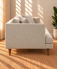 Load image into Gallery viewer, Image 3 of 5: Shelby upholstered sofa in Stone Mist boucle fabric with deep lounge seating, loose cushions, and tapered Rubberwood legs
