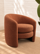 Load image into Gallery viewer, Sienna lounge chair in burnt sienna bouclé with curved barrel back, rounded arms, and removable seat cushion
