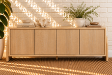 Load image into Gallery viewer, Sloan Minimalist Buffet Credenza in Blonde Oak with four doors, interior shelving, and tapered legs
