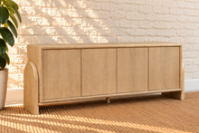 Load image into Gallery viewer, Sloan Minimalist Buffet Credenza in Blonde Oak with four doors, interior shelving, and tapered legs

