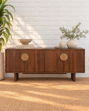 Load image into Gallery viewer, Stefan natural brown mango wood credenza with fluted cabinet doors, round cork handles, four-door storage, and wood legs.

