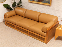 Load image into Gallery viewer, Early 1980’s Italian Sofa with Caning Detail and New Leather Upholstery
