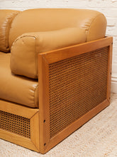 Load image into Gallery viewer, Early 1980’s Italian Sofa with Caning Detail and New Leather Upholstery
