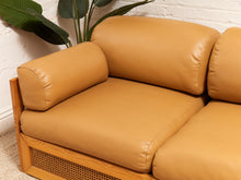 Load image into Gallery viewer, Early 1980’s Italian Sofa with Caning Detail and New Leather Upholstery
