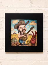 Load image into Gallery viewer, Desert Troubadour Framed Whimsical Cowboy Musician Artwork
